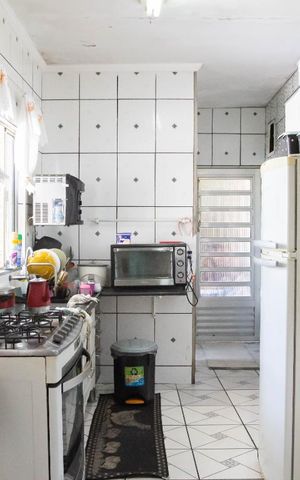 Casa à venda com 190m², 4 quartos e 5 vagas Casa à venda com 190m², 4 quartos e 5 vagasCozinha