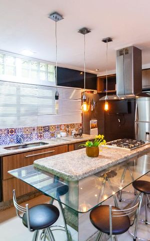 Casa à venda com 125m², 3 quartos e 2 vagas Casa à venda com 125m², 3 quartos e 2 vagasCozinha