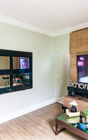 Casa à venda com 125m², 3 quartos e 2 vagas Casa à venda com 125m², 3 quartos e 2 vagasSala de TV