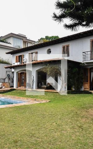 Casa à venda com 540m², 4 quartos e 7 vagas Casa à venda com 540m², 4 quartos e 7 vagasFachada posterior