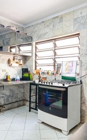 Casa à venda com 132m², 3 quartos e 2 vagas Casa à venda com 132m², 3 quartos e 2 vagasCozinha