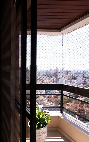 Apartamento à venda com 204m², 4 quartos e 3 vagas Apartamento à venda com 204m², 4 quartos e 3 vagasVaranda Lateral da Sala de Estar