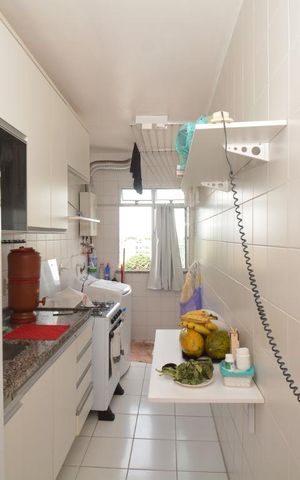 Apartamento à venda com 62m², 2 quartos e 1 vagaCozinha e Área de Serviço
