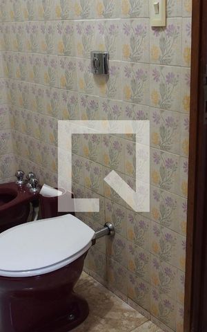 Casa à venda com 420m², 4 quartos e 2 vagasBanheiro 3