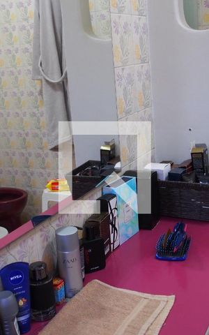 Casa à venda com 420m², 4 quartos e 2 vagasBanheiro 3