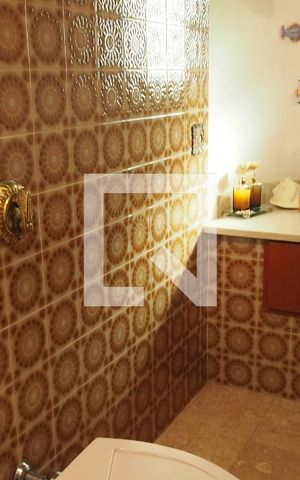 Casa à venda com 420m², 4 quartos e 2 vagasLavabo