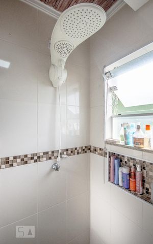 Casa de condomínio à venda com 111m², 3 quartos e 2 vagasBanheiro do Quarto 1