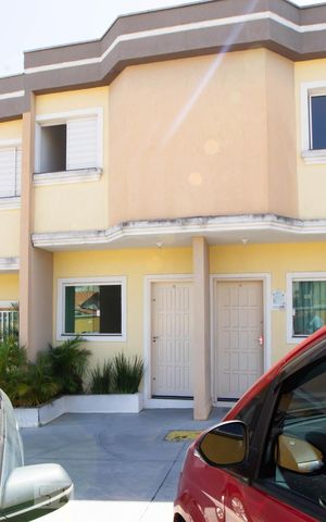 Casa de condomínio à venda com 65m², 2 quartos e 1 vaga Casa de condomínio à venda com 65m², 2 quartos e 1 vagaFachada