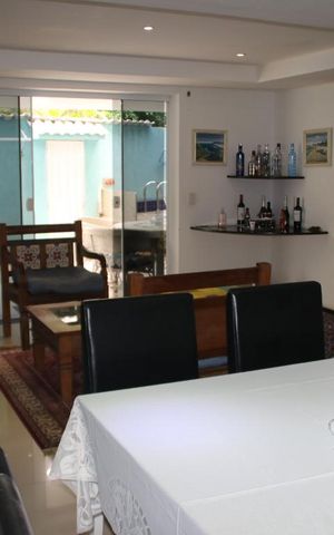 Casa de condomínio à venda com 250m², 5 quartos e 2 vagasSala 1