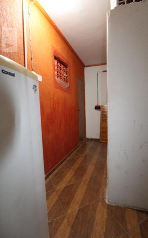 Casa à venda com 118m², 7 quartos e sem vagaCorredor