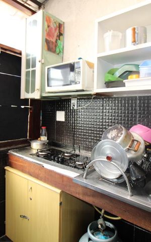 Casa à venda com 118m², 7 quartos e sem vagaCozinha