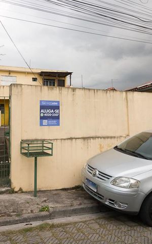 Casa à venda com 40m², 1 quarto e sem vagaFachada das casas e placa Quinto Andar
