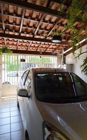 Casa à venda com 113m², 3 quartos e 1 vaga Casa à venda com 113m², 3 quartos e 1 vagaGaragem