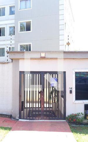 Apartamento à venda com 43m², 2 quartos e 1 vagaFachada do condomínio - Placa instalada no portão