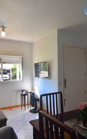 Casa de condomínio à venda com 93m², 3 quartos e 2 vagasSala
