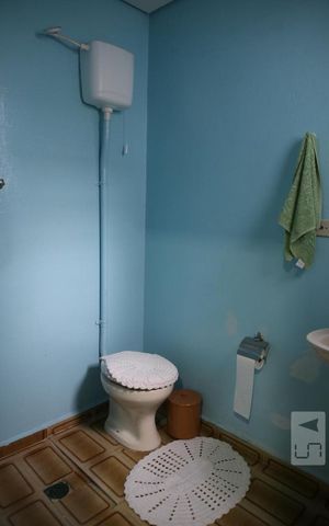 Casa para alugar com 100m², 2 quartos e 3 vagasBanheiro da Suite