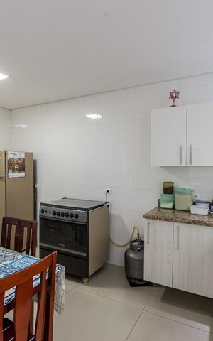 Casa à venda com 90m², 2 quartos e 3 vagas Casa à venda com 90m², 2 quartos e 3 vagasCozinha