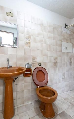 Casa à venda com 120m², 4 quartos e 4 vagasBanheiro de Serviço