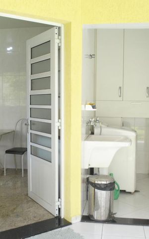 Casa à venda com 390m², 3 quartos e 4 vagasCozinha e Área de Serviço