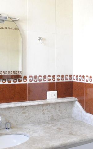 Casa à venda com 390m², 3 quartos e 4 vagasBanheiro da Suíte