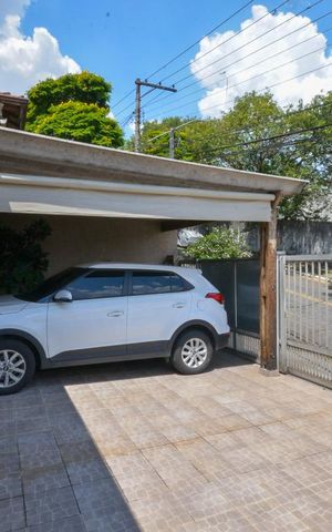 Casa à venda com 320m², 4 quartos e 3 vagas Casa à venda com 320m², 4 quartos e 3 vagasGaragem