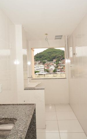 Apartamento à venda com 49m², 2 quartos e 1 vagaCozinha e Área de Serviço