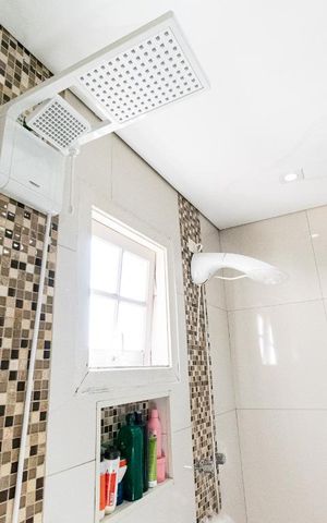 Casa à venda com 420m², 3 quartos e 4 vagas Casa à venda com 420m², 3 quartos e 4 vagasBanheiro da Suíte 1
