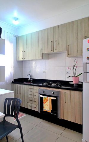 Apartamento à venda com 100m², 2 quartos e 2 vagasCozinha
