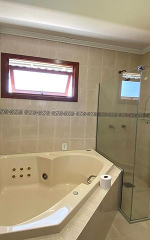Casa à venda com 450m², 4 quartos e 3 vagasBanheiro da Suíte 