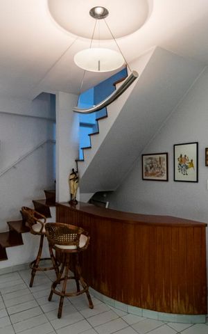 Casa à venda com 380m², 5 quartos e 2 vagas1o. Andar - Sala de TV