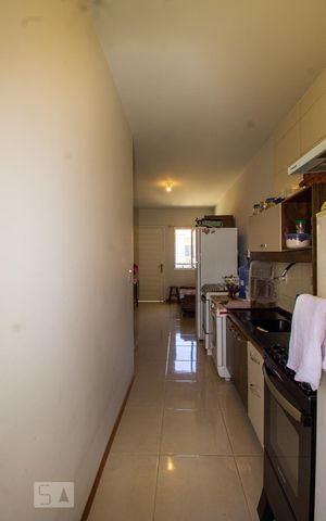 Casa de condomínio à venda com 50m², 2 quartos e 1 vaga Casa de condomínio à venda com 50m², 2 quartos e 1 vagaCozinha e Área de Serviço