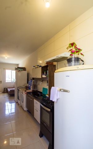 Casa de condomínio à venda com 50m², 2 quartos e 1 vaga Casa de condomínio à venda com 50m², 2 quartos e 1 vagaCozinha e Área de Serviço