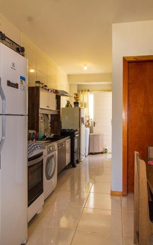 Casa de condomínio à venda com 50m², 2 quartos e 1 vaga Casa de condomínio à venda com 50m², 2 quartos e 1 vagaCozinha e Área de Serviço
