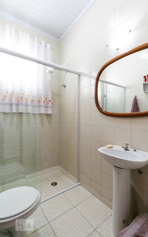 Casa à venda com 107m², 3 quartos e 1 vagaBanheiro 2