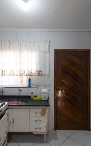 Casa à venda com 85m², 2 quartos e 2 vagas Casa à venda com 85m², 2 quartos e 2 vagasCozinha