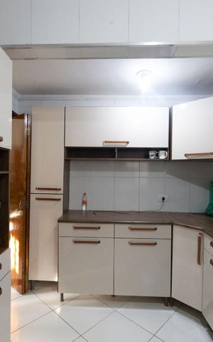 Casa à venda com 85m², 2 quartos e 2 vagas Casa à venda com 85m², 2 quartos e 2 vagasCozinha