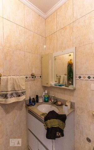 Casa de condomínio para alugar com 500m², 4 quartos e 4 vagasBanheiro da Suíte 2