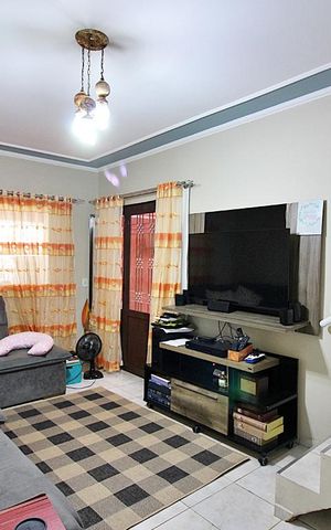 Casa à venda com 256m², 4 quartos e 2 vagasSala