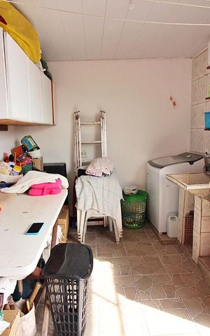 Casa à venda com 256m², 4 quartos e 2 vagasLavanderia