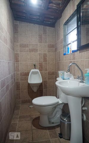 Casa à venda com 240m², 5 quartos e 3 vagasLavabo da Churrasqueira