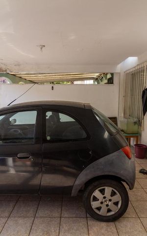Casa à venda com 212m², 4 quartos e 3 vagas Casa à venda com 212m², 4 quartos e 3 vagasGaragem