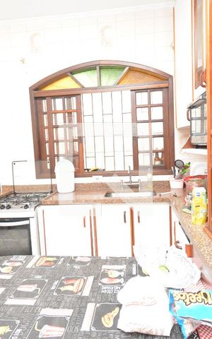 Casa à venda com 115m², 4 quartos e 2 vagas Casa à venda com 115m², 4 quartos e 2 vagasCozinha