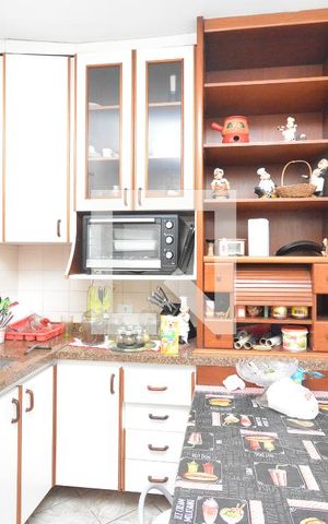 Casa à venda com 115m², 4 quartos e 2 vagas Casa à venda com 115m², 4 quartos e 2 vagasCozinha