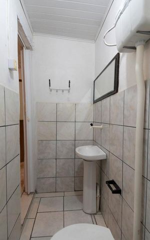 Casa à venda com 250m², 6 quartos e 4 vagasBanheiro 3