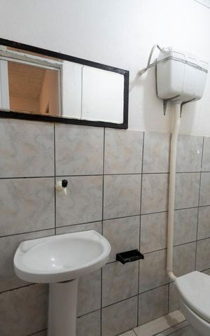 Casa à venda com 250m², 6 quartos e 4 vagasBanheiro 3