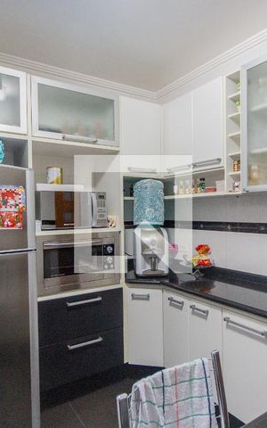 Casa à venda com 148m², 2 quartos e 2 vagas Casa à venda com 148m², 2 quartos e 2 vagasCozinha