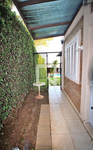 Casa à venda com 788m², 9 quartos e 10 vagasCorredor de acesso ao quintal