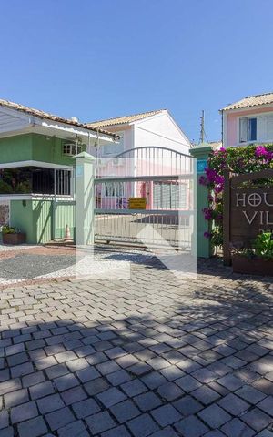 Casa de condomínio à venda com 77m², 3 quartos e 2 vagas Casa de condomínio à venda com 77m², 3 quartos e 2 vagasFachada