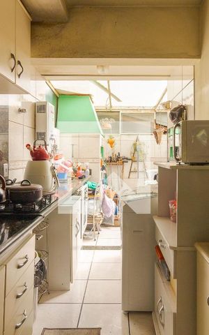 Casa de condomínio à venda com 77m², 3 quartos e 2 vagas Casa de condomínio à venda com 77m², 3 quartos e 2 vagasCozinha