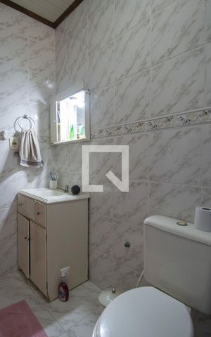Casa de condomínio à venda com 251m², 4 quartos e 3 vagasBanheiro da Suite